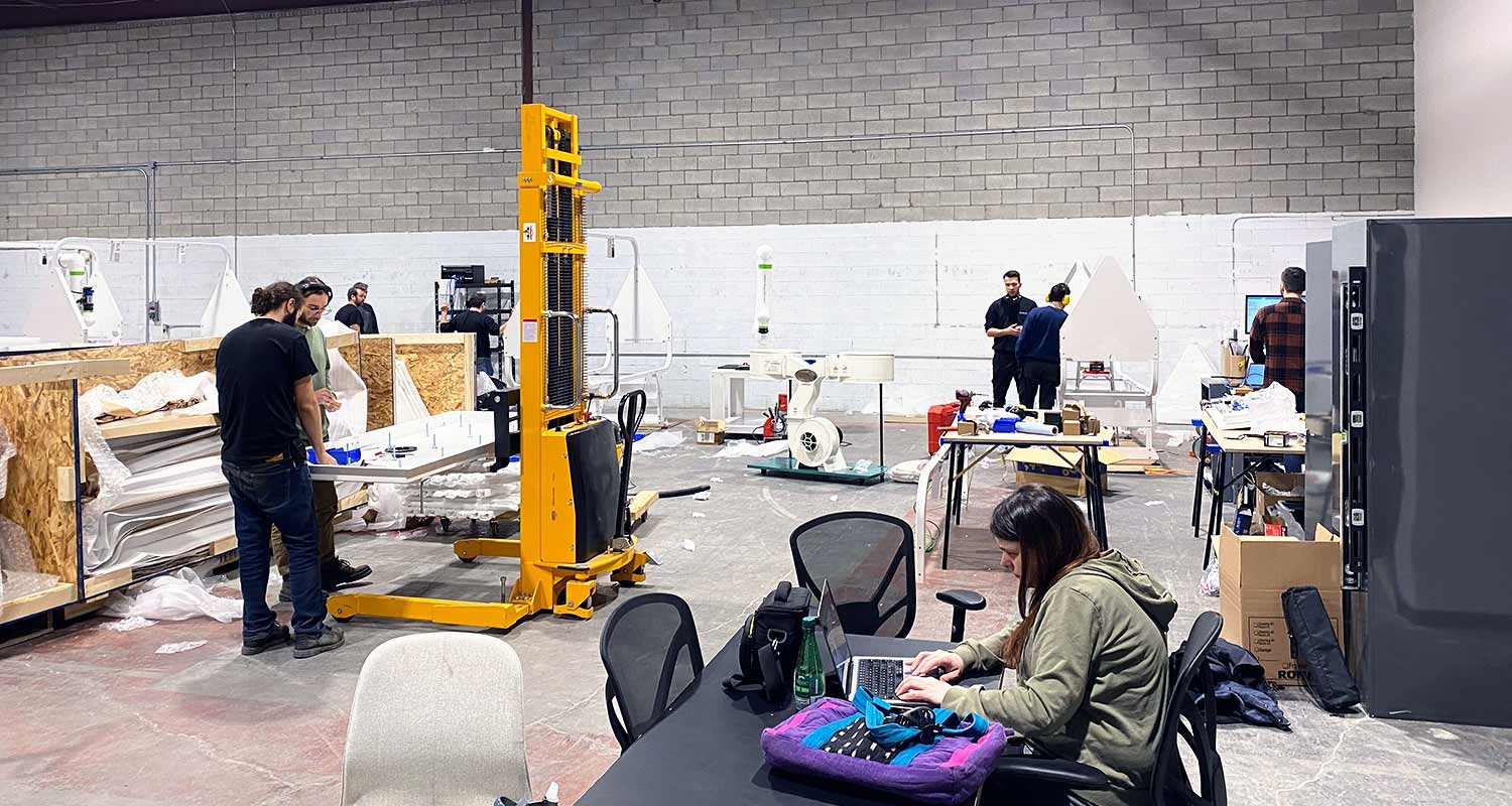 Omnirobotic team members hard at work at the new Laval facility