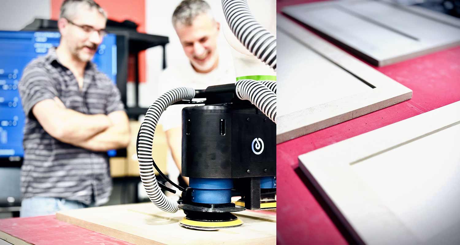 François Simard and Tamas Zsoldos, owner of Kivalo Fine Cabinetry, share a conversation at Omnirobotic’s booth during Woodworking Technology Days, Akhurst, Toronto, October 2024.