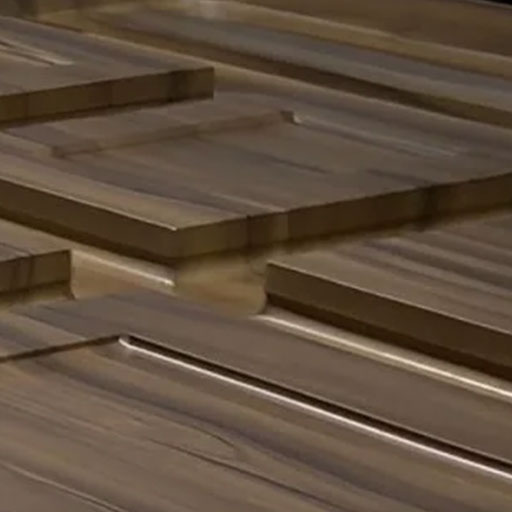 Piles of wooden planks stacked in a workshop or lumberyard setting, ready for sale or use.